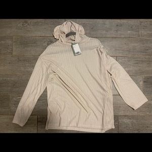 Long sleeve with hood. Never worn!